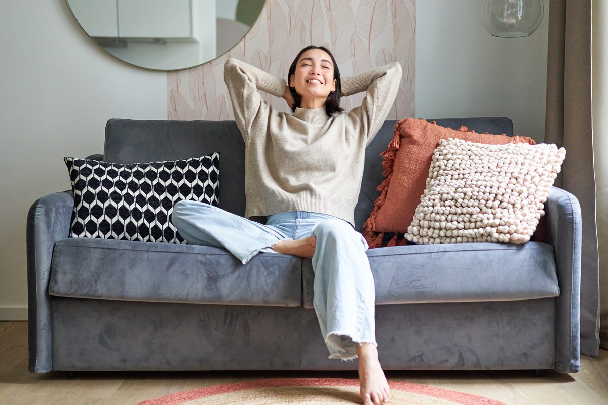A woman at home looking calm and reassured
