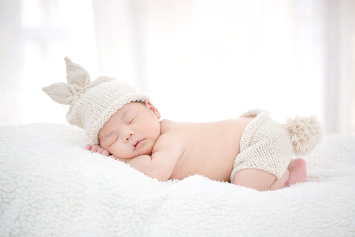 A newborn baby being cared for