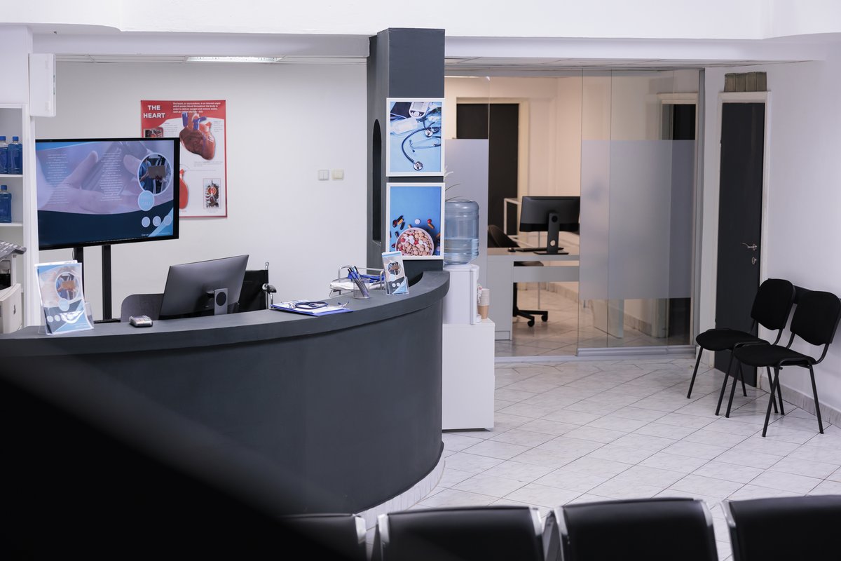 A bright, modern medical clinic reception and waiting area